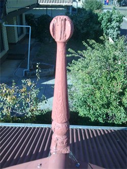 Timber finial was not maintained well and rotted away before being repainted